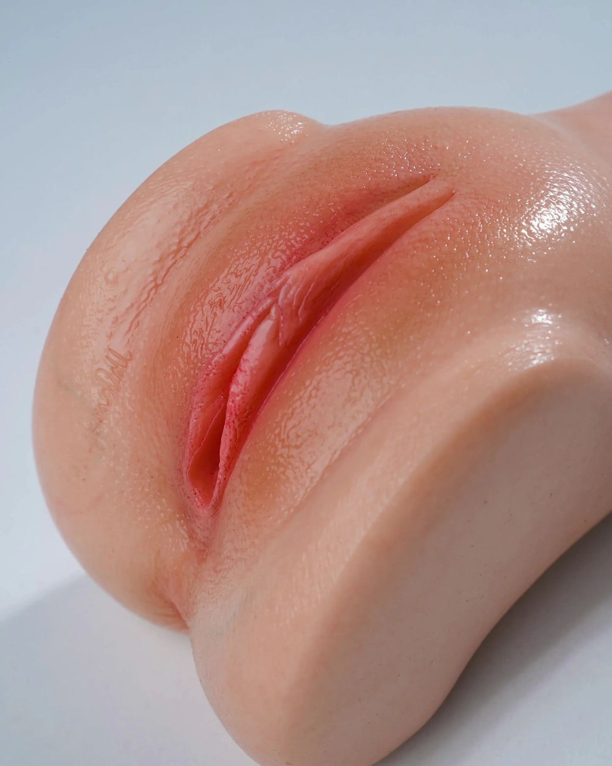 Three-quarter view of the HKD Realistic Silicone Stroker