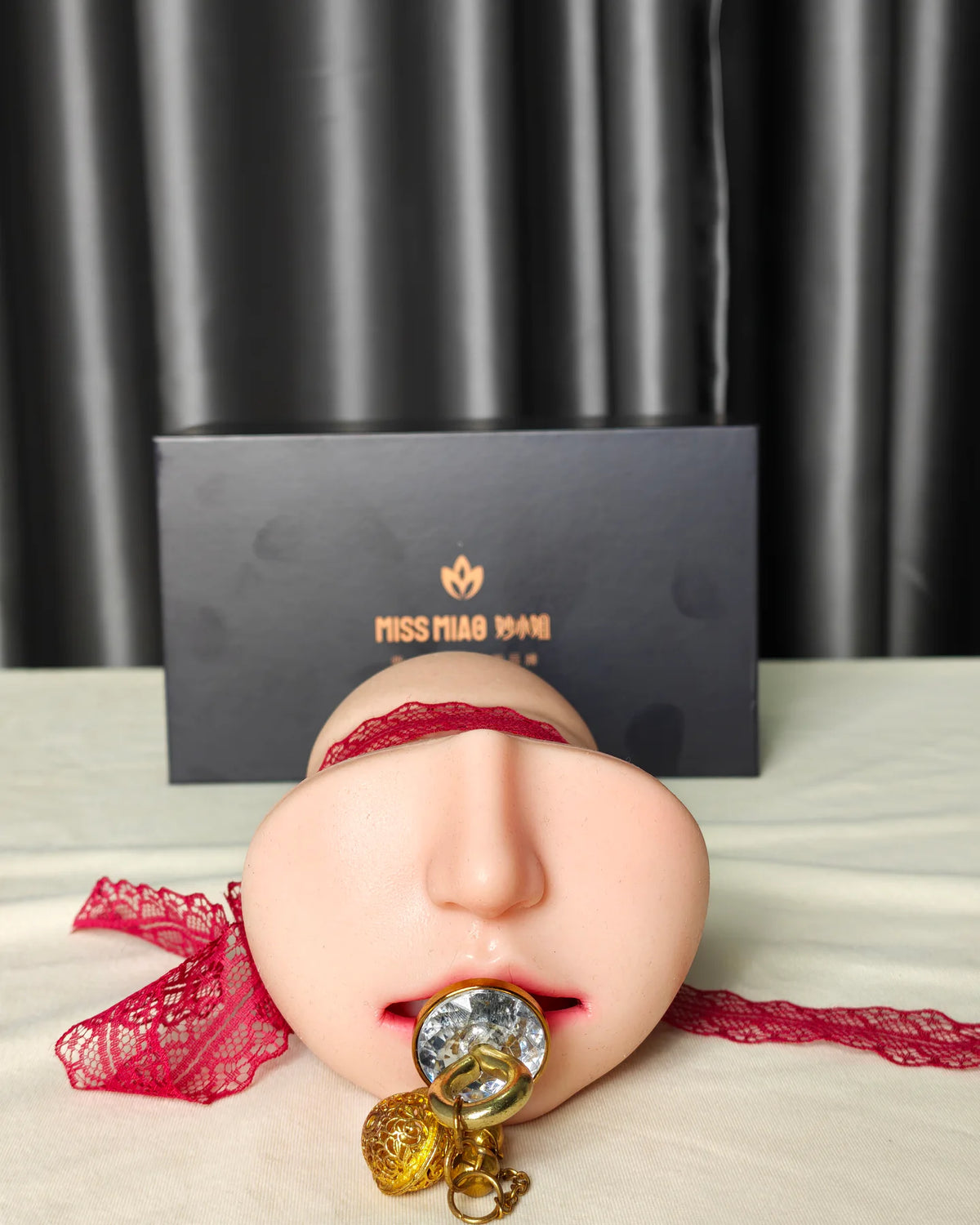Wenwen Realistic Deep Throat Stroker front detail with decorative accessory and product box