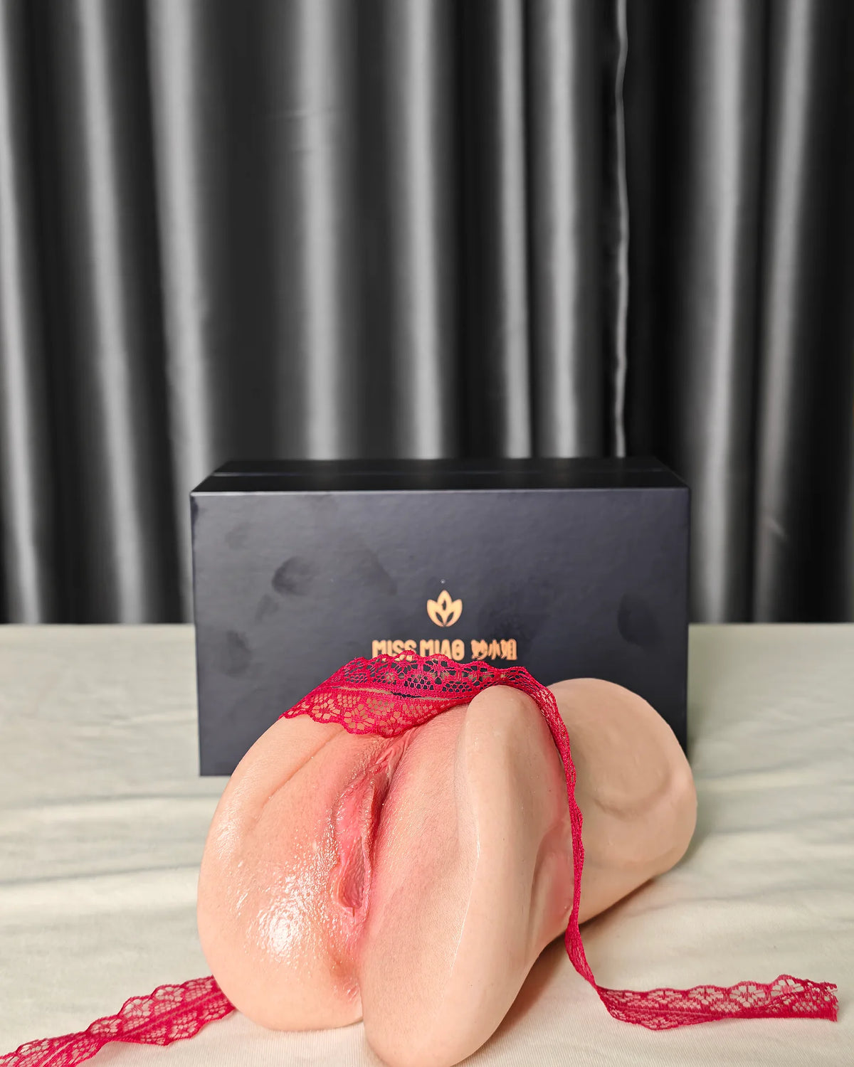 Wenwen Realistic Silicone Stroker front detail with red lace and product box